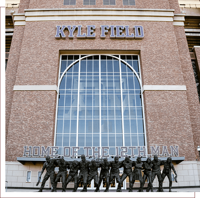 A group of people standing in front of a building.